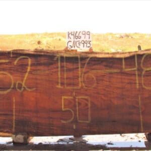 Wooden slab with numbers and text written.
